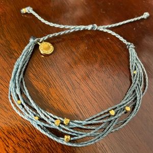 Pura Vida medium blue multi-strand bracelet with gold-tone bead accents